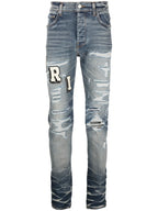 Amiri Blue Skinny-fit Logo-appliquéd Distressed Jeans