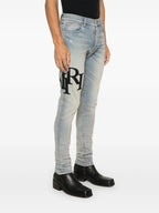 Amiri Blue Skinny-fit Logo-appliquéd Staggered Jeans